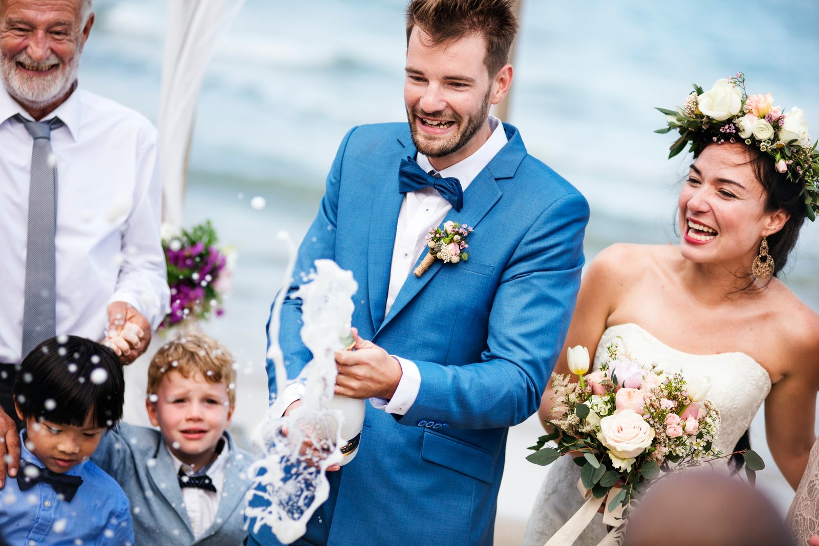 young-couple-in-a-wedding-ceremony-at-the-beach.jpg